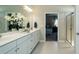 Bathroom featuring double vanity, white cabinetry, and a glass-enclosed shower at 524 Lanier Way, Temple, GA 30179