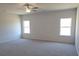 Spacious bedroom with natural light, neutral carpet, and ample room for furnishings at 524 Lanier Way, Temple, GA 30179