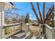 Wooden deck overlooking a spacious backyard with mature trees and a clear blue sky at 135 Adair Se Ave, Atlanta, GA 30315