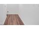 Hallway features hardwood floors and white trim at 674 Valleyview Dr, Forest Park, GA 30297