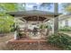 Inviting outdoor gazebo with comfortable seating area, perfect for entertaining and relaxation at 6791 Yacht Club Dr, Acworth, GA 30102