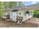 Well-maintained outbuilding offering storage with brick details and well kept landscaping at 6791 Yacht Club Dr, Acworth, GA 30102