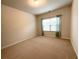 Bright bedroom with neutral carpet and window with privacy blinds at 4030 Rockcap Cv, Buford, GA 30519