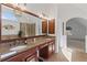 Luxurious bathroom boasting double sinks, granite countertop and a walk-in shower at 406 Greyfield Dr, Canton, GA 30115
