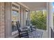 Cozy front porch with rocking chairs offers a relaxing outdoor space at 406 Greyfield Dr, Canton, GA 30115