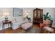 Cozy living room with classic decor, hardwood floors, and natural light at 406 Greyfield Dr, Canton, GA 30115