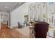 Bright living room with high ceilings, large windows, and cozy seating area at 406 Greyfield Dr, Canton, GA 30115