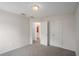 Neutral bedroom with carpet, and access to a bathroom at 190 The Falls Blvd, Covington, GA 30016