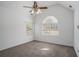 Bright bedroom with a vaulted ceiling and large windows at 190 The Falls Blvd, Covington, GA 30016