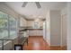 Bright kitchen featuring white cabinetry and appliances at 190 The Falls Blvd, Covington, GA 30016