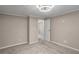 Spacious bedroom with a glimpse into another room via the open doorway at 3265 Newcastle Way, Snellville, GA 30039