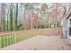 Wooden deck overlooks the expansive backyard, perfect for outdoor entertaining at 3265 Newcastle Way, Snellville, GA 30039