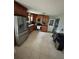 Well-equipped kitchen with stainless steel appliances and ample cabinet space at 4034 Weeks Nw Dr, Kennesaw, GA 30144