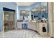 Large primary bathroom featuring a shower, tile floor, and double sink vanity with lots of counter space at 6000 E Andechs Smt, Johns Creek, GA 30097