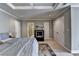 Bedroom with a bed, carpet, and white doors at 6000 E Andechs Smt, Johns Creek, GA 30097