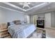 Bedroom features a bed and detailed ceiling at 6000 E Andechs Smt, Johns Creek, GA 30097