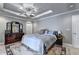 Bedroom features a bed, dresser, and detailed ceiling at 6000 E Andechs Smt, Johns Creek, GA 30097