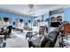 Spacious living room with built-in shelving, fireplace, and comfortable seating creating a welcoming area at 6000 E Andechs Smt, Johns Creek, GA 30097