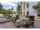 Modern rooftop deck features comfortable lounge chairs, manicured lawns, and contemporary design at 775 Juniper Ne St # 334, Atlanta, GA 30308