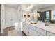 This bathroom has a double sink vanity and an oversized mirror over the top at 2759 Porches Ln, Dacula, GA 30019