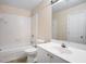 Bathroom featuring tile flooring, vanity, and a combined shower and tub unit at 5053 Kingsbridge Pass, Powder Springs, GA 30127