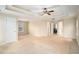 Spacious main bedroom with a tray ceiling and multiple windows for natural light at 5053 Kingsbridge Pass, Powder Springs, GA 30127