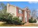 Attractive two-story brick and siding home with a manicured front yard at 5053 Kingsbridge Pass, Powder Springs, GA 30127