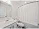 Functional bathroom featuring tub/shower combo with modern fixtures and vanity at 614 Edgemore Rd, Canton, GA 30114
