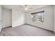 Bright bedroom featuring plush carpet, neutral walls and a window that floods the room with light at 614 Edgemore Rd, Canton, GA 30114