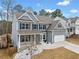 Charming two-story home with blue shutters and a well-manicured front yard at 614 Edgemore Rd, Canton, GA 30114