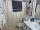 Functional bathroom features a shower, toilet, and vanity with neutral decor at 2408 Three Bars Dr, Snellville, GA 30078
