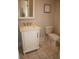 Bathroom showcases a vanity with a white sink, plus a toilet at 5315 Austrian Pine Ct, Cumming, GA 30040