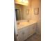 Bathroom featuring double sinks, white cabinets, and modern fixtures at 5315 Austrian Pine Ct, Cumming, GA 30040