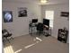 Well-lit bedroom with space for a desk setup and leisure area at 5315 Austrian Pine Ct, Cumming, GA 30040