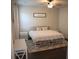 Bedroom with ceiling fan and light-colored walls at 5315 Austrian Pine Ct, Cumming, GA 30040