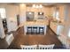 Bright, modern kitchen featuring a center island, stainless steel appliances, and hardwood floors at 5315 Austrian Pine Ct, Cumming, GA 30040