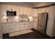 Beautiful kitchen with granite counters, stainless steel appliances, and white cabinets at 5315 Austrian Pine Ct, Cumming, GA 30040