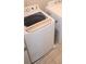 Bright laundry room features a modern washing machine and dryer at 5315 Austrian Pine Ct, Cumming, GA 30040