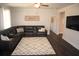Inviting living room with hardwood floors, cozy seating, and ample natural light at 5315 Austrian Pine Ct, Cumming, GA 30040
