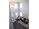 Open living room with large windows, soaring ceilings, and modern decor at 5315 Austrian Pine Ct, Cumming, GA 30040