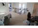 Spacious loft area with neutral carpet and view of bedroom at 5315 Austrian Pine Ct, Cumming, GA 30040