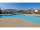 Community pool area with clear blue water, providing a refreshing and relaxing space for residents at 5315 Austrian Pine Ct, Cumming, GA 30040