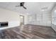 Basement featuring wood-look floors, built-in shelving, and ample space for activities at 4711 Oakleigh Manor Dr, Powder Springs, GA 30127