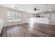 Spacious basement area with wood-look flooring, a window, and a kitchenette at 4711 Oakleigh Manor Dr, Powder Springs, GA 30127