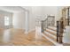 Bright living room with hardwood floors, natural light, and open layout at 4711 Oakleigh Manor Dr, Powder Springs, GA 30127