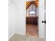 Unfinished walk-in closet with wooden floor and view of vaulted ceiling at 4711 Oakleigh Manor Dr, Powder Springs, GA 30127