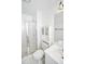 Clean bathroom featuring a shower, toilet, vanity, and medicine cabinet at 5730 Paces Pl, Suwanee, GA 30024