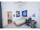 Bright bedroom featuring whimsical decor, a comfy bed, and modern desk setup at 5730 Paces Pl, Suwanee, GA 30024