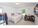 Simple bedroom design with closet and natural light at 5730 Paces Pl, Suwanee, GA 30024