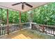 Inviting outdoor deck overlooking a lush, green backyard space at 5730 Paces Pl, Suwanee, GA 30024